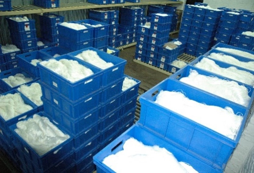 Conditionnement en vrac de nos tresses dans des caisses